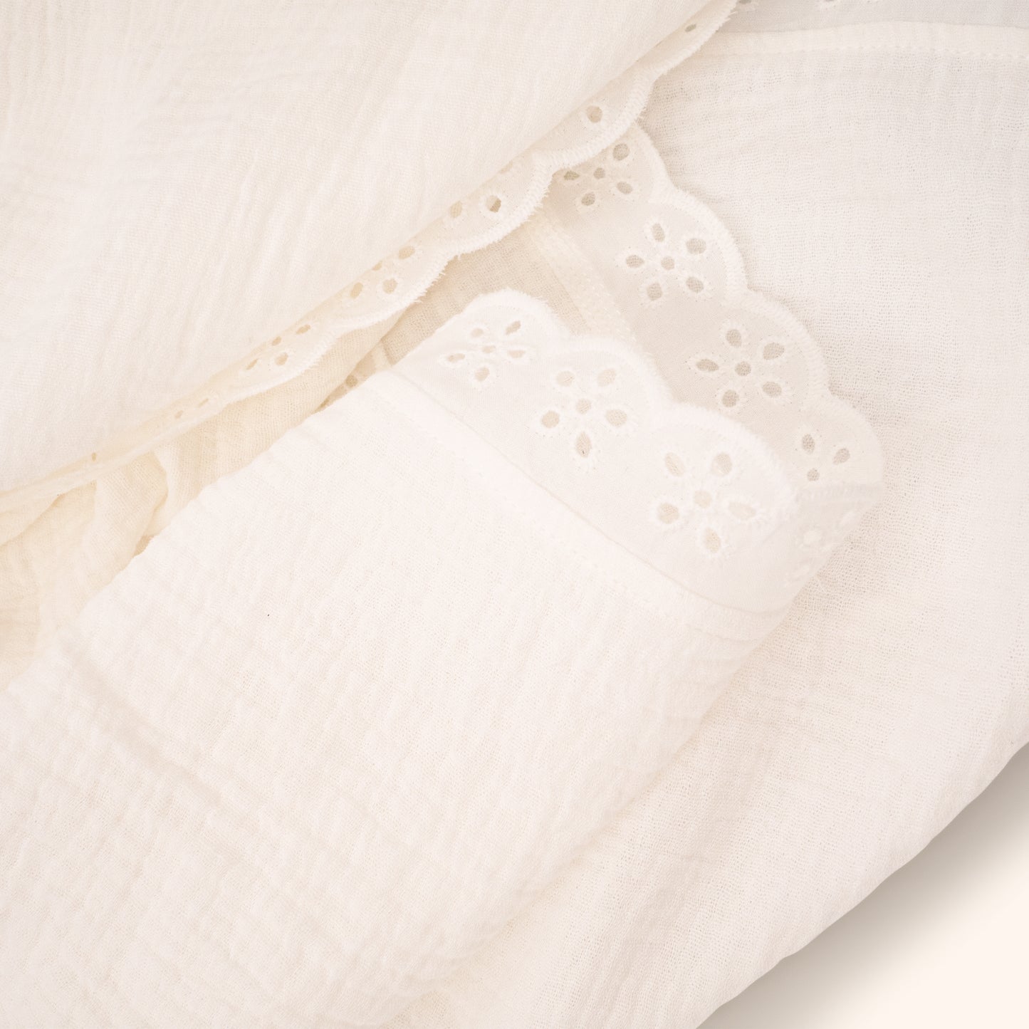 Organic Cotton Fleur Swaddle · Gardenia