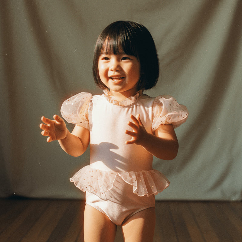 Petit Playa Ballet Swimsuit in Fairy Pink print, sun-safe UPF50+ swimwear for babies and girls