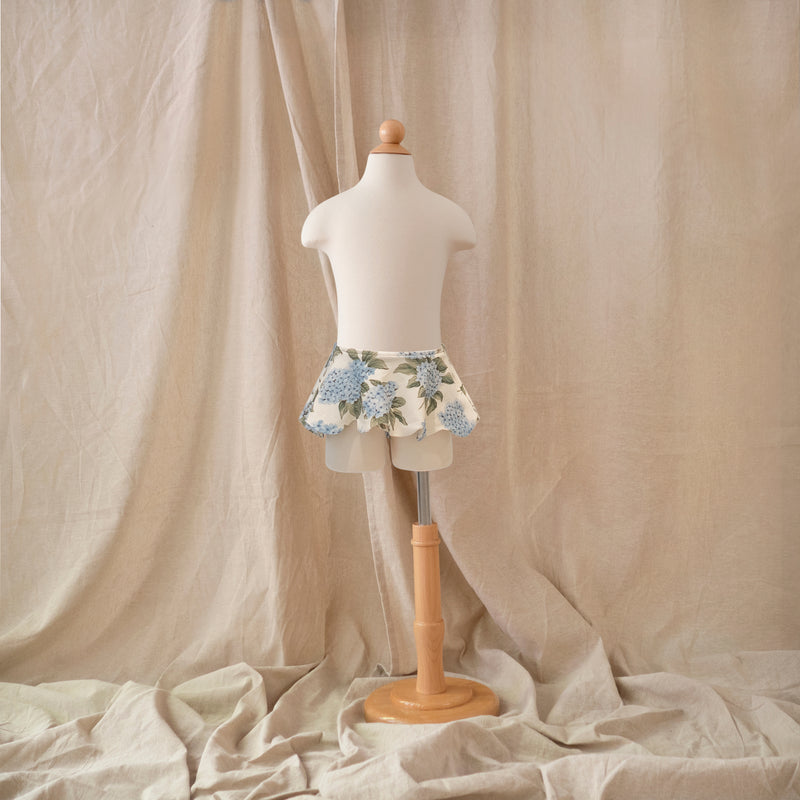 Petit Playa Petal Bikini Skirt in Bloom print, sun-safe UPF50+ swimwear for babies and girls