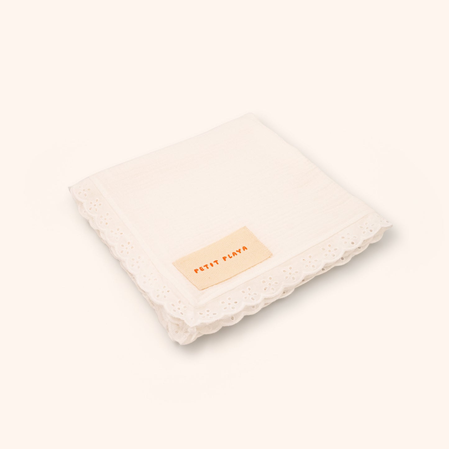 Organic Cotton Fleur Swaddle · Gardenia